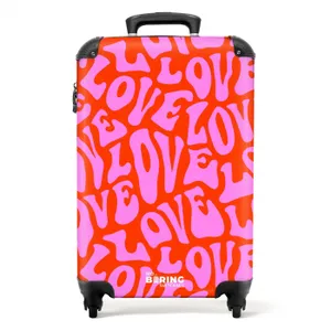 Suitcase - Repeating 'LOVE' pattern in pink on red