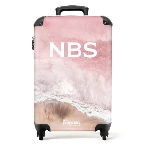 Beach with pink sea