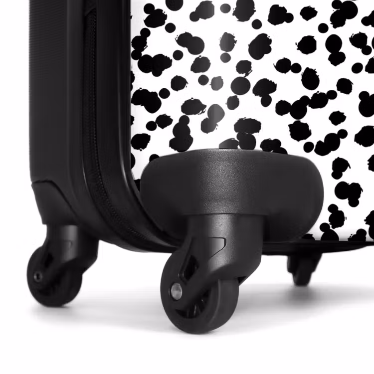 Suitcase - Black brush-like dots on a white background. — 7