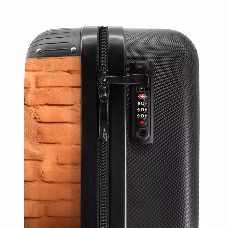 Suitcase - Big-eyed monkey looks through hole in brick wall — 6