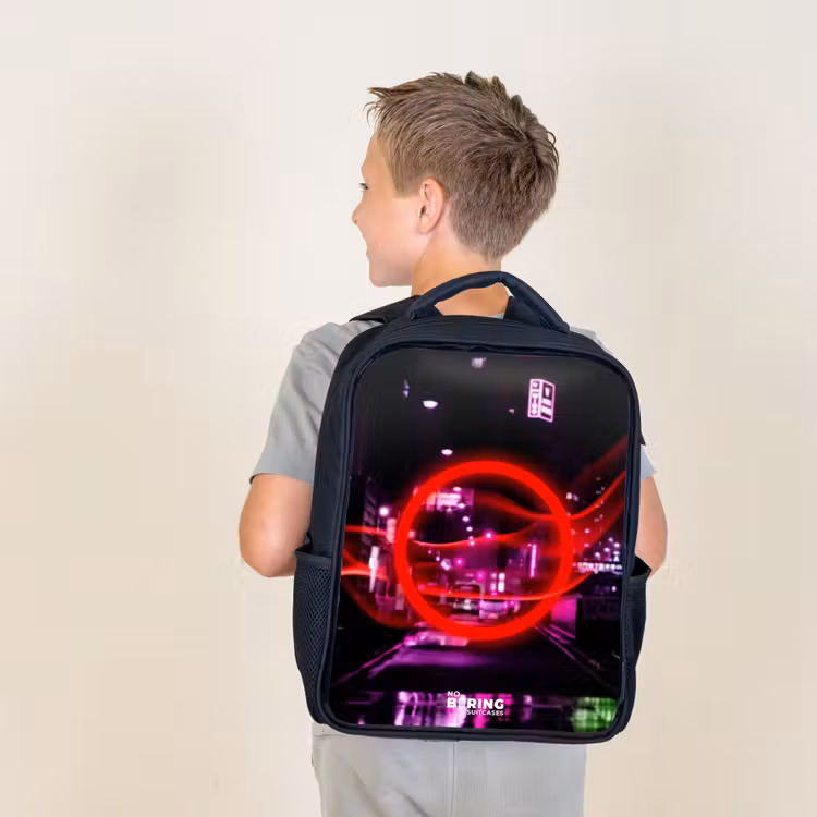 Kids backpack - Black - Bright red circle over a neon-lit city — 2