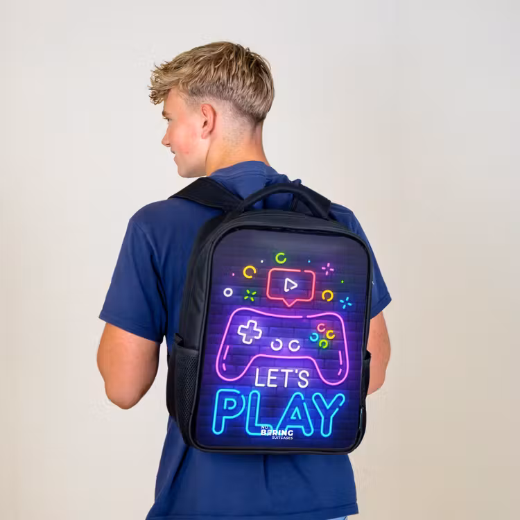 Kids backpack - Black - Neon controller against a brick wall — 5