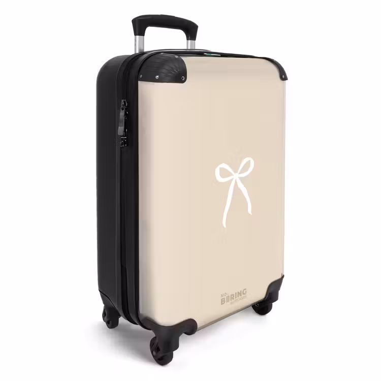 Suitcase - White bow on beige background — 2