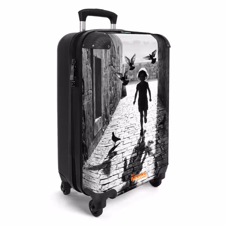 Suitcase - Child - Bird - Street - Black-and-white - Playing — 2